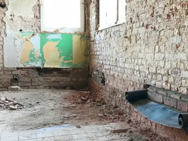 Muren onderkappen proces